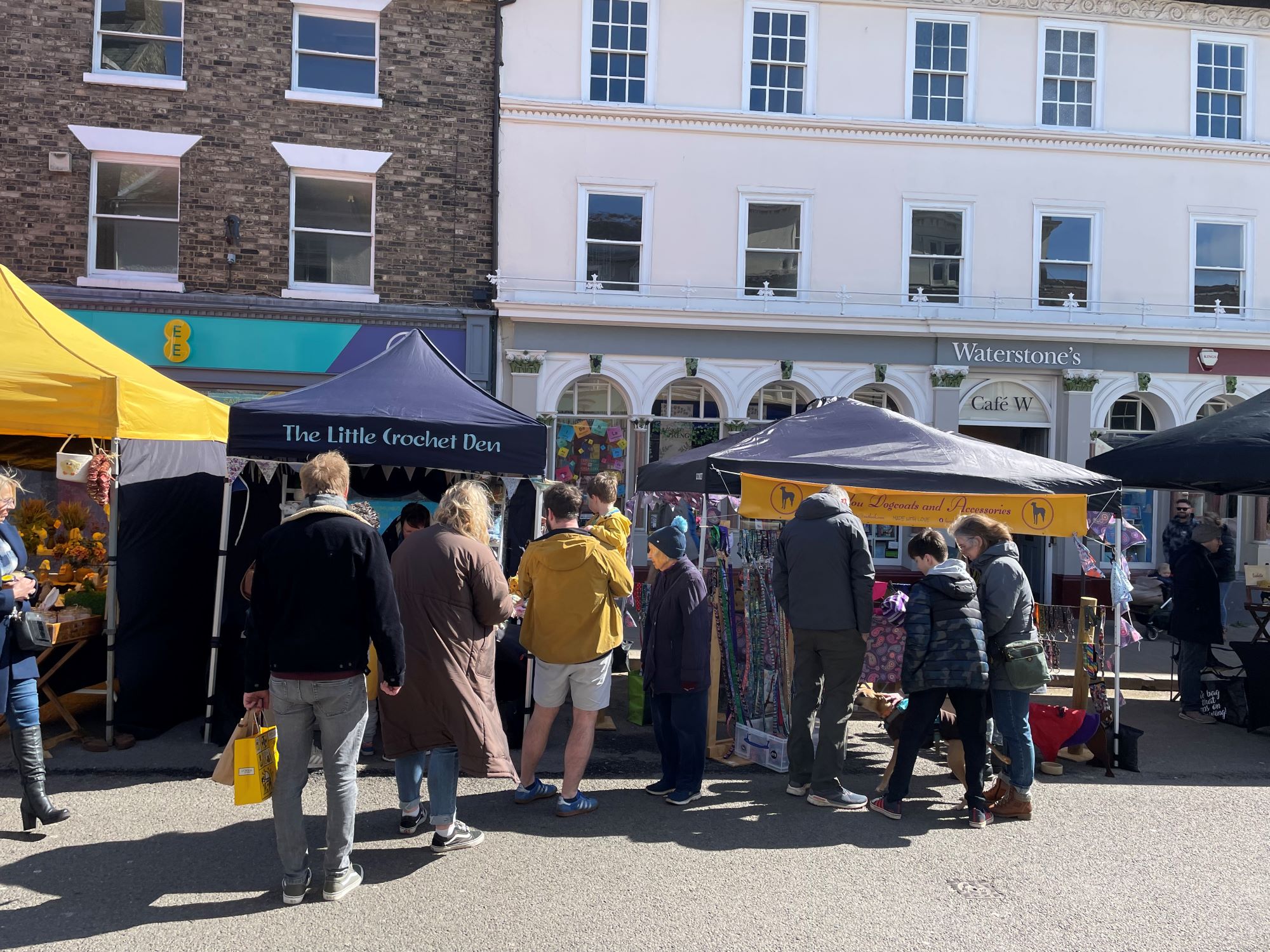 Image of people looking at a market stall