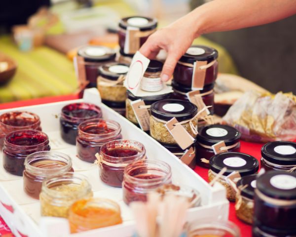A display of jams at the market stall